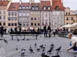 Menschen auf dem Marktplatz von Warschau, Polen